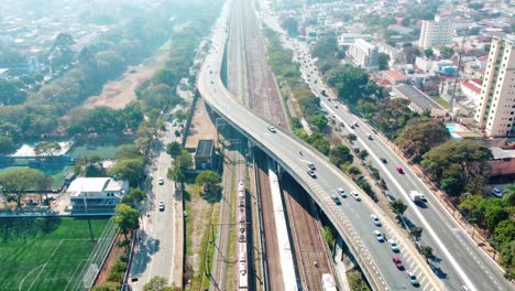 Cars,-buses,-and-trains-of-subway-and-rail-lines-in-an-urban-landscape-in-Sao-Paulo-Brazil