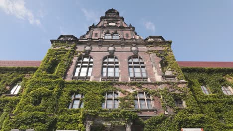 wroclaw national museum exterior with renaissance-style architecture and lush greenery