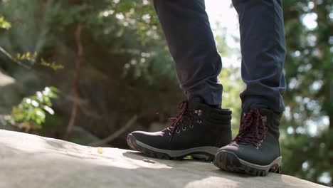 Side-view-of-hiker's-legs