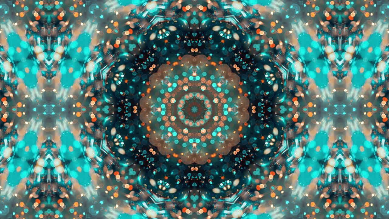 Glittering kaleidoscope isolated on black background