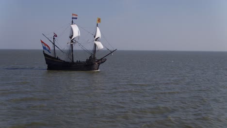 an onward aerial footage towards the halve maen ship at the middle of the sea