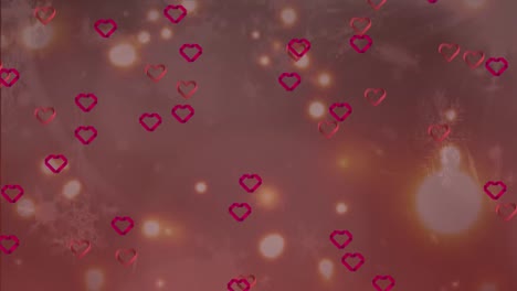 animation of multiple red heart icons, spots of light and snowflakes icons against grey background