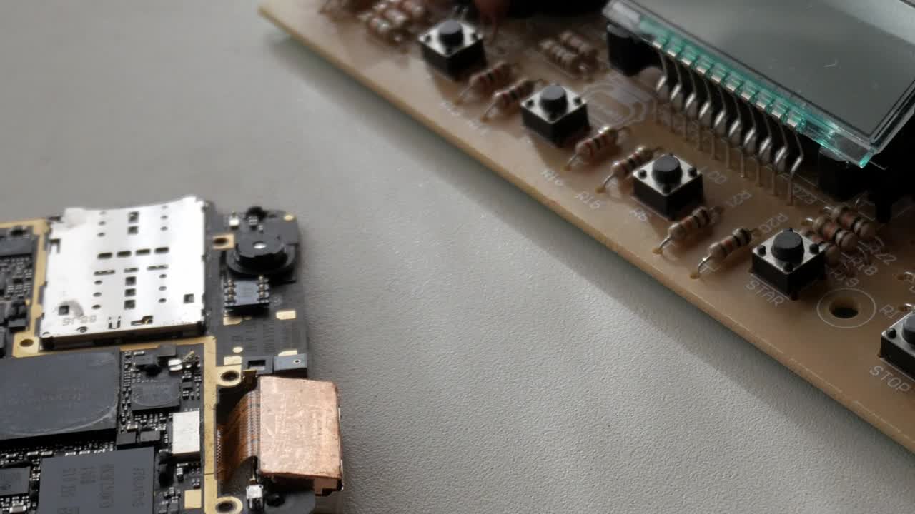 Electronics circuit board with detailed components, focus on chips and connectors