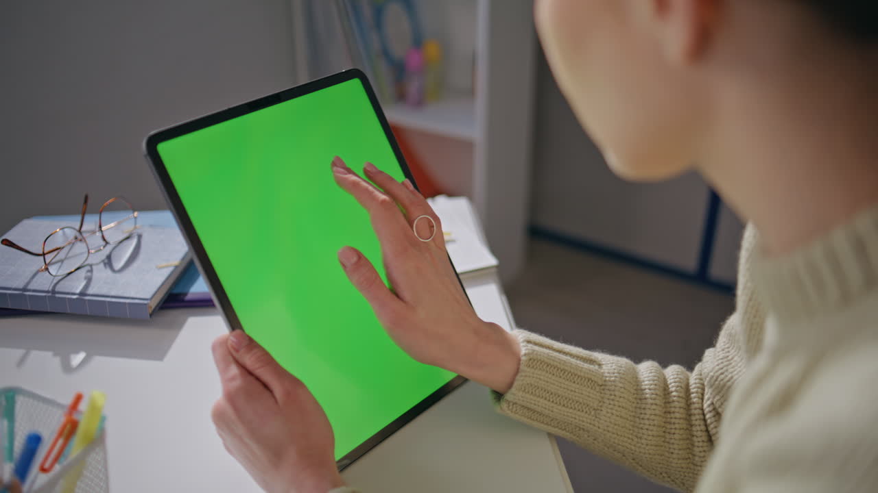Teacher hands swiping mockup computer at school closeup. Woman scrolling tablet