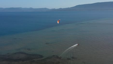 kite surfing on neretva valley, adriatic sea - aerial drone view