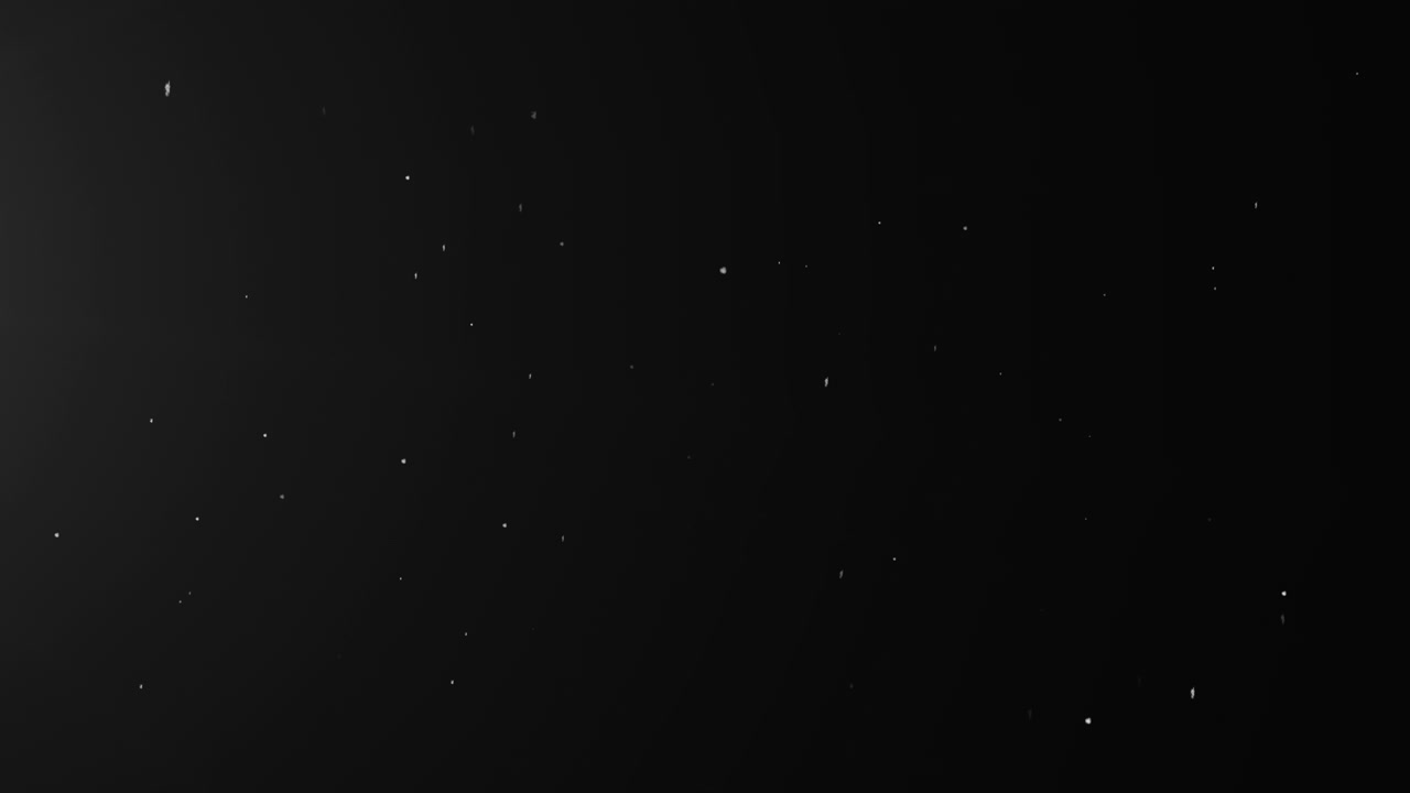 Tiny White Glowing space dust particles on black screen background ...