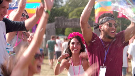 friends enjoying bubbles at a music festival, slow motion