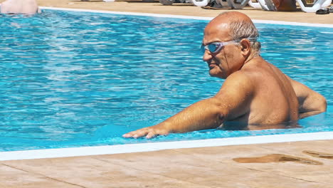old man in swimming pool