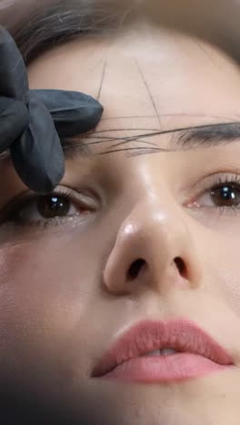 close-up of eyebrow mapping for permanent makeup