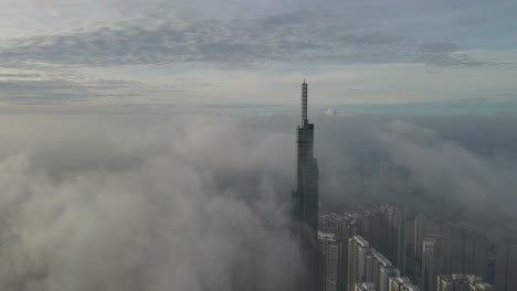 clouds fly over high-rise buildings in ho chi