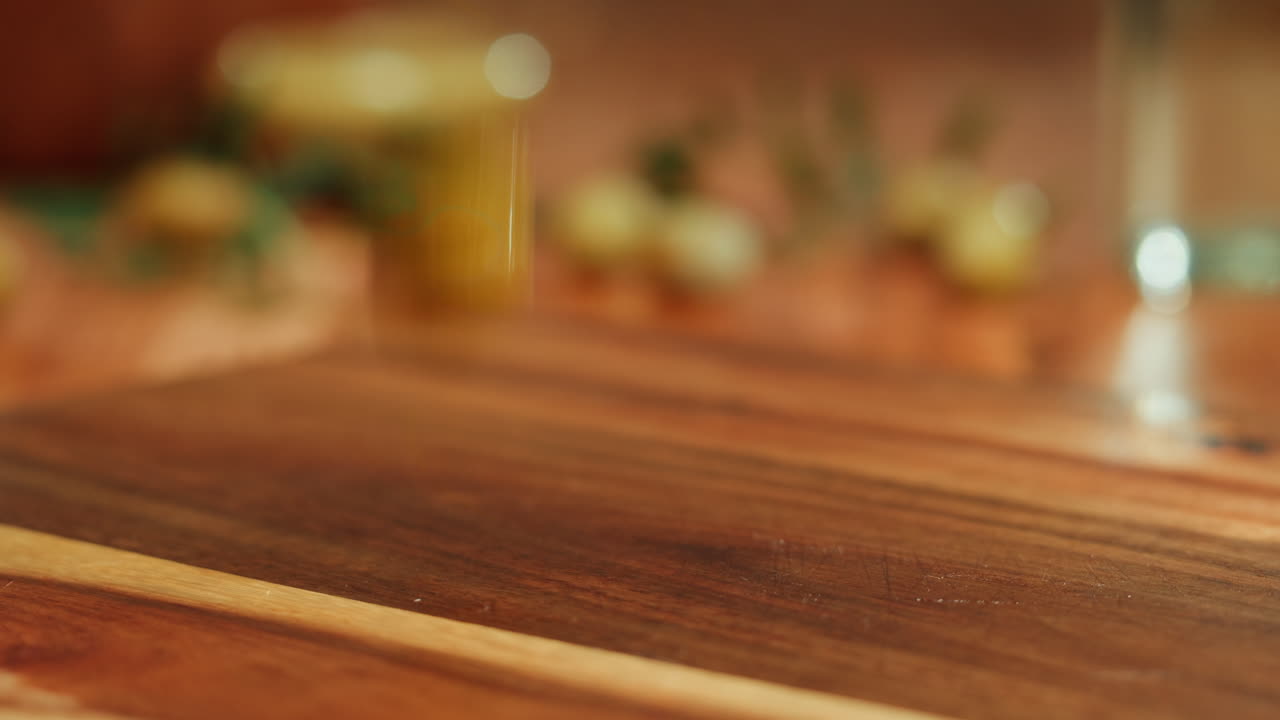 Green Olives on a Wooden Board
