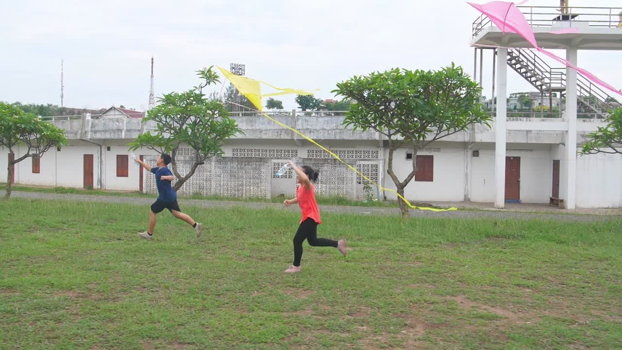 Children Flying Kites in a Park