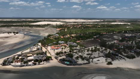 drone aéreo de primeira linha acima da praia de tatajuba, local de kitesurf do brasil, dunas do deserto no paraíso tropical latino-americano