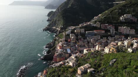 riomaggiore cinque terre italy aerial overhead pullback shows city