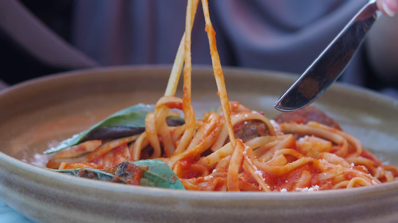 Eating Spaghetti with Meatballs