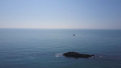 Aerial-view:-boat-out-at-sea