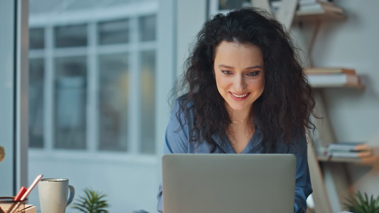 Smiling woman enjoying coffee break in modern office. Closeup inspired worker