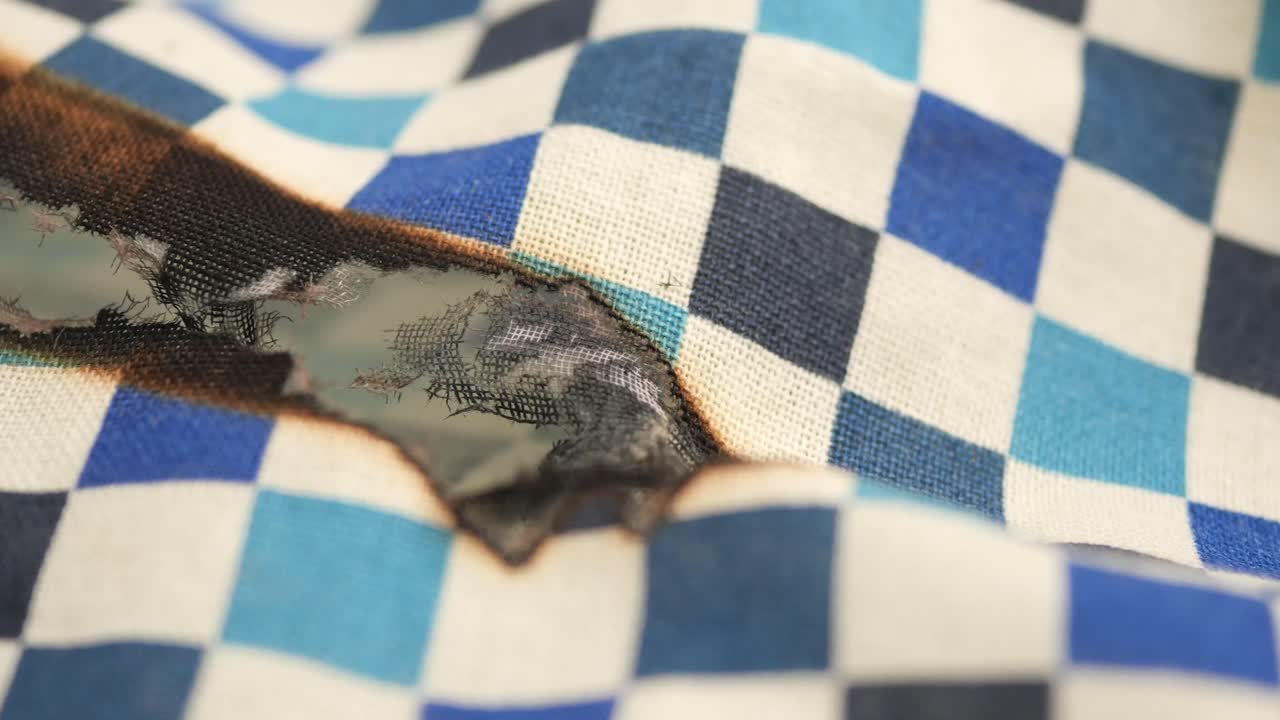 Burnt and Damaged Checkered Fabric
