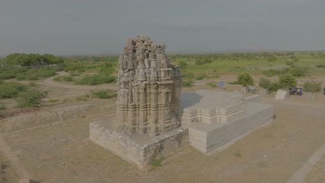 aerial drone footage records the jain temple in nagarparkar, pakistan, under sunny skies and clear weather