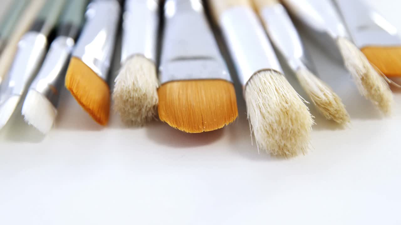 Close-up of various paint brushes