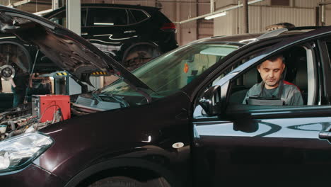 mechanic working on a car in a garage