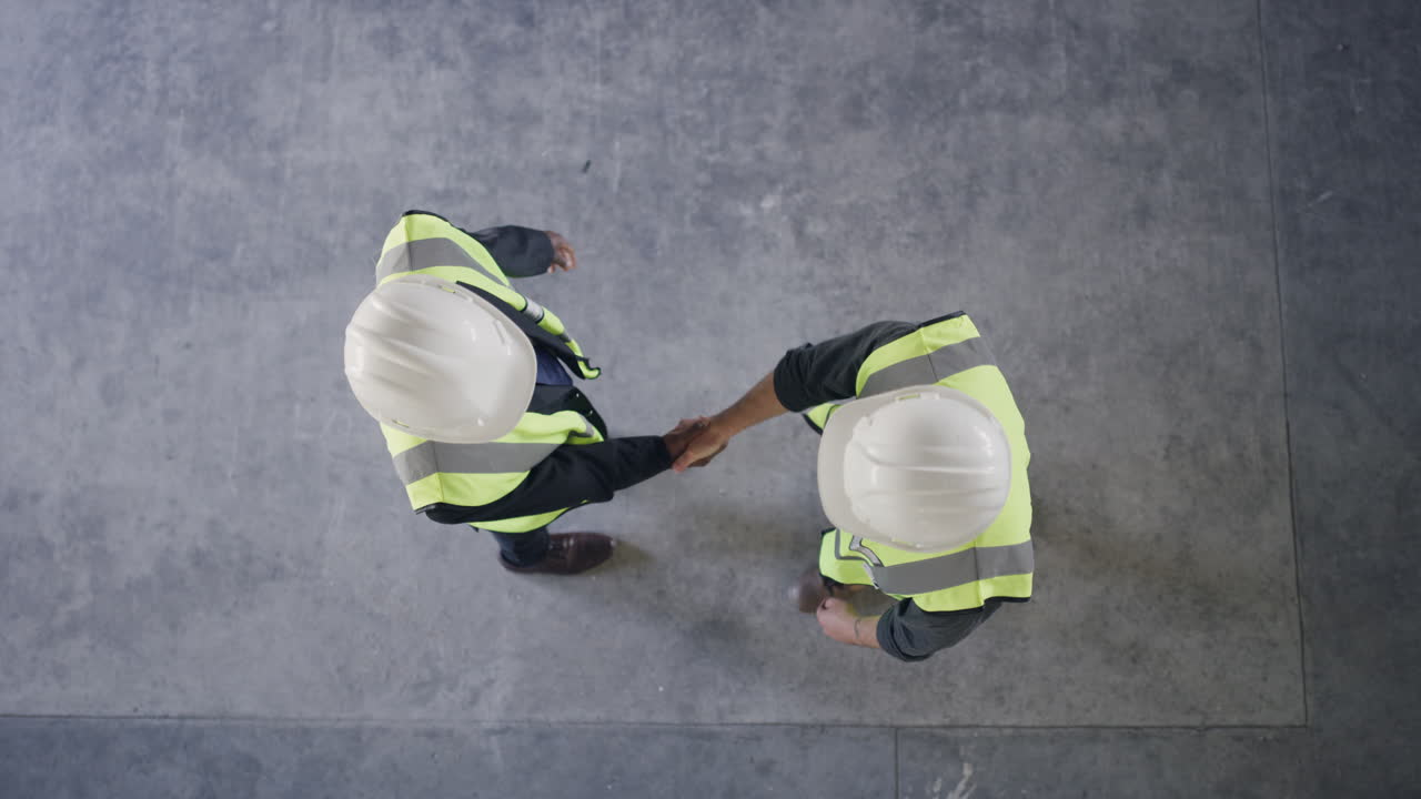 Construction Workers Handshake