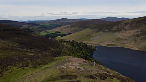 one of ireland's beautiful lakes called the guinness lake or lough tay, on a spring morning