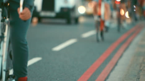 Closeup-of-a-group-of-people-cycling-through