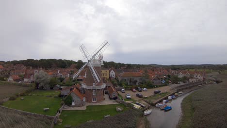 Aerial-drone-footage-of-Cley-Next-To-Sea,-and-the-surrounding-scenery,-Norfolk