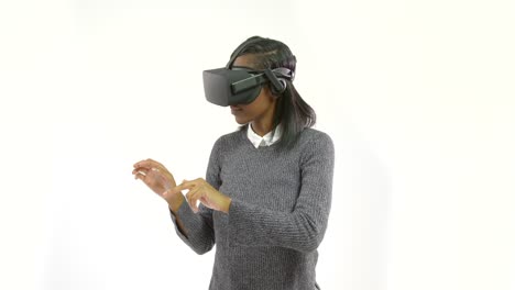 young woman gesturing with vr headset