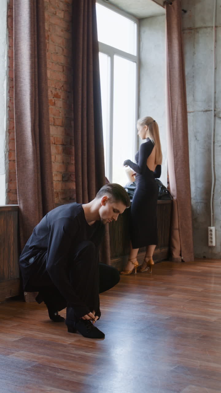 Dancers preparing in a studio