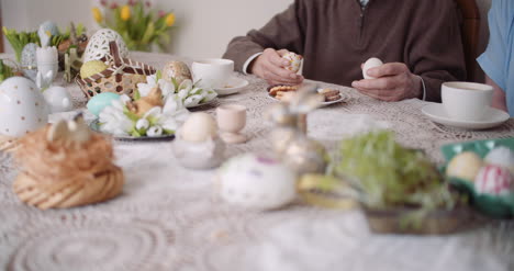 Elcerly-People-Care-Senior-Man-Holding-Easter-Eggs-In-Hands-Happy-Easter-