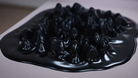 black ferrofluid spikes