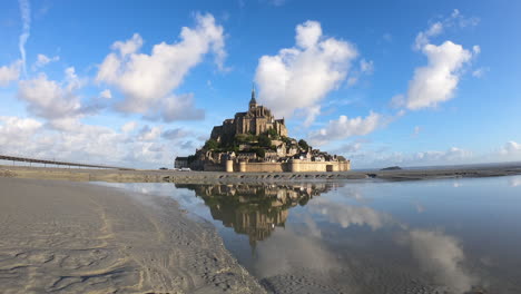 amazing reflection of mont saint-michel, normandy, france