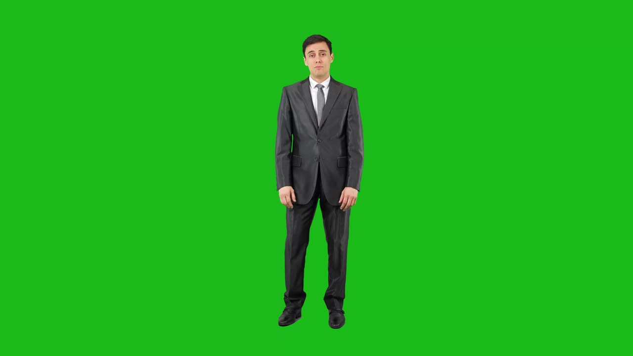 Businessman in Suit Displaying Various Gestures and Expressions on Green Screen