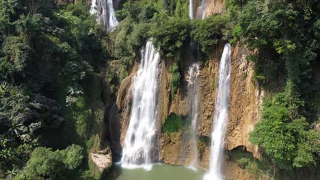 A-pretty-4K-drone-shot-of-two-of-the-waterfalls-of-Thi-Lo-Su-Waterfall-in-the-adventures-jungle-landscape-of-North-Thailand,-located-in-the-area-of-Umphang-in-Asia