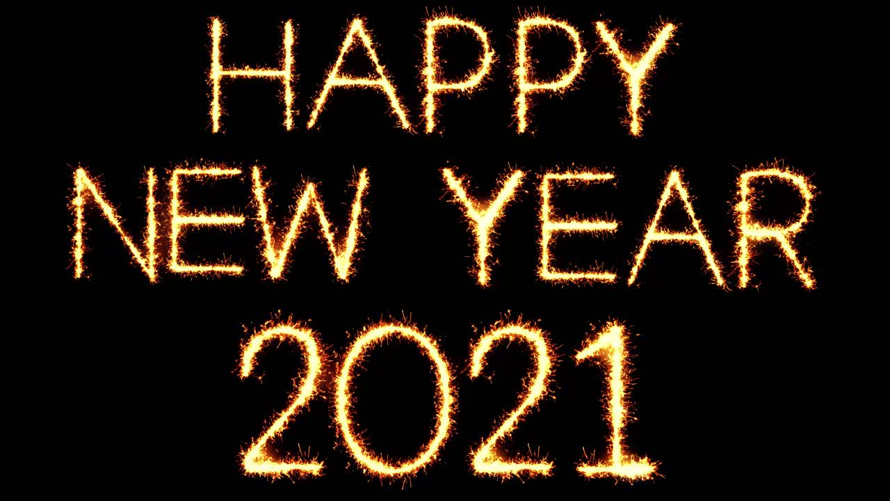 Felice anno nuovo 2021, scritta luminosa con scintille glitterate, particelle e fuochi d'artificio su loop 4K nero