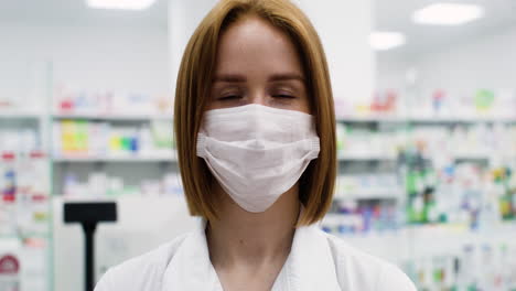 red-haired woman in a pharmacy