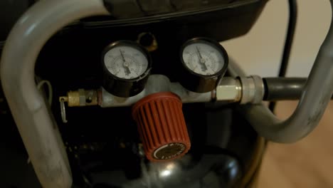 circular industrial pressure gauges on a coffee bean roasting machine. measuring equipment, sensors for measuring pressure, manometers, manometer technical.