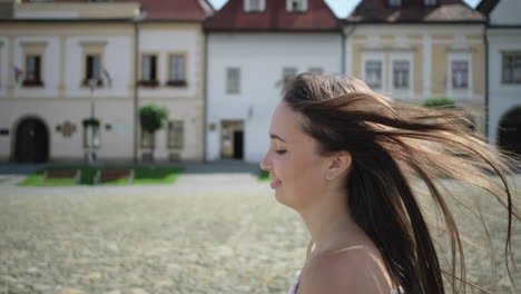 young woman in city square