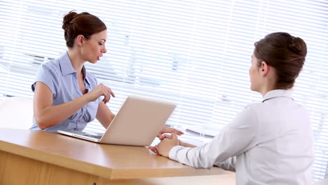 businesswoman interviewing woman