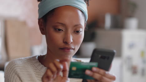 beautiful woman using smartphone shopping online spending money on credit card mobile banking app with digital currency enjoying financial freedom