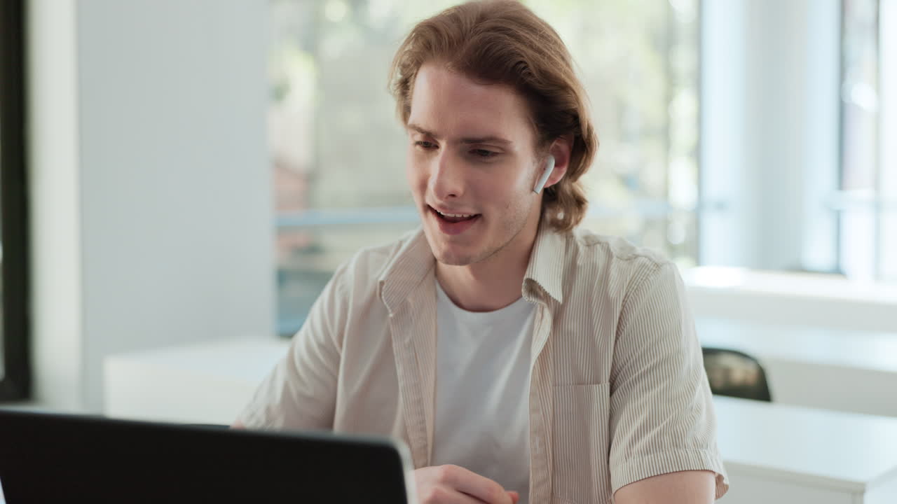 Man having a video call on a laptop