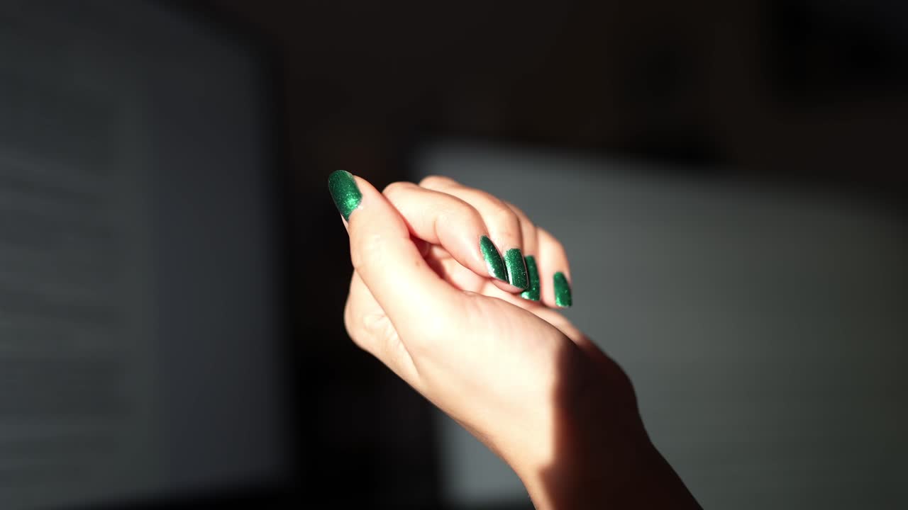 Glossy Green Manicure on Woman Hand, Static Shot