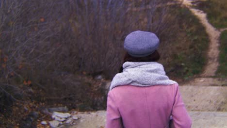 woman walking outdoors in autumn