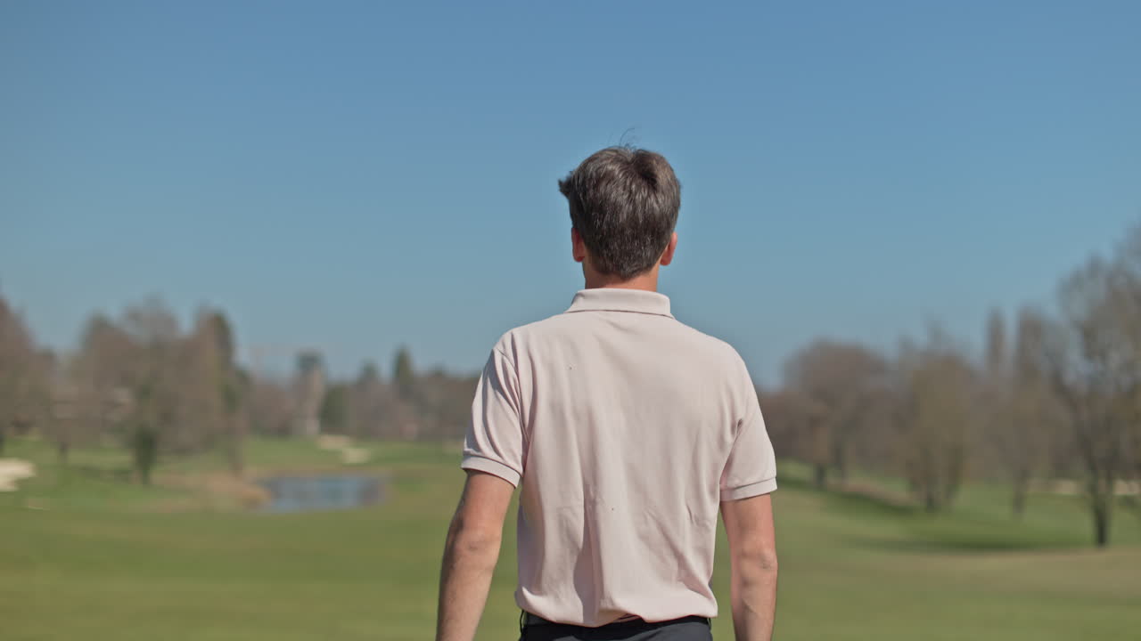 Young golfer playing on a sunny spring day in Switzerland, showcasing precise chipping, putting, bunker, and approach shots. Perfect for sports, lifestyle, and outdoor themes.