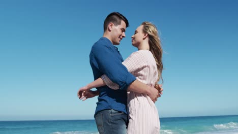 couple in love enjoying free time on the beach together