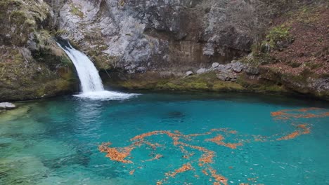 hiking around theth to the blue eye, grunas waterfall and in the albanian alps during fall season or autumn season