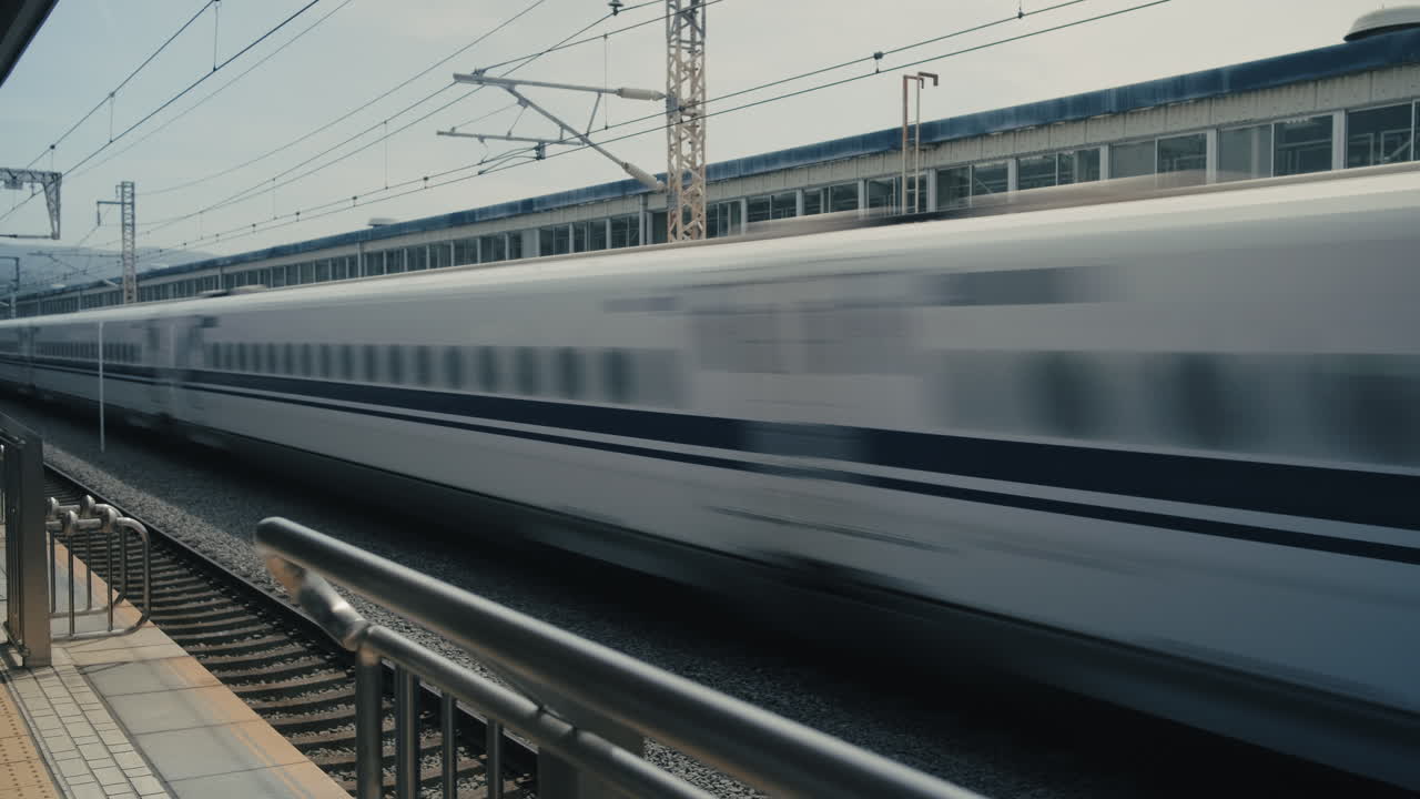 High-Speed Shinkansen Train at Station