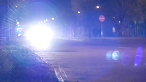 cinematic bokeh with night city street traffic. cars and people in the light of headlights and lanterns cinematic bokeh with night city street traffic. cars and people in the light of headlights and lanterns